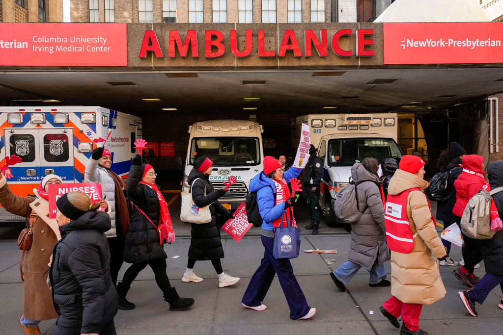 Nurses strike outside New York-Presbyterian Hospital, Monday, Jan. 12, 2026, in New York. (AP Photo/Yuki Iwamura)