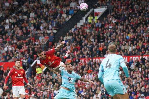 FILE - Manchester United's Benjamin Sesko, center left, heads the ball ahead of Burnley's Kyle Walker during the English Premier League soccer match between Manchester United and Burnley at Old Trafford stadium in Manchester, England, on Aug. 30, 2025. (AP Photo/Ian Hodgson, File) FILE - Manchester United's Benjamin Sesko, center left, heads the ball ahead of Burnley's Kyle Walker during the English Premier League soccer match between Manchester United and Burnley at Old Trafford stadium in Manchester, England, on Aug. 30, 2025. (AP Photo/Ian Hodgson, File)