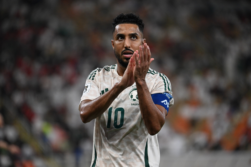 Saudi Arabia's Salem Al Dawsari applauds fans during the World Cup 2026 Asian qualifier fourth-round Group B soccer match between Saudi Arabia and Indonesia at Alinma Bank Stadium in King Abdullah Sports City, in Jiddah, Saudi Arabia, Wednesday, Oct. 8, 2025. (AP Photo)
