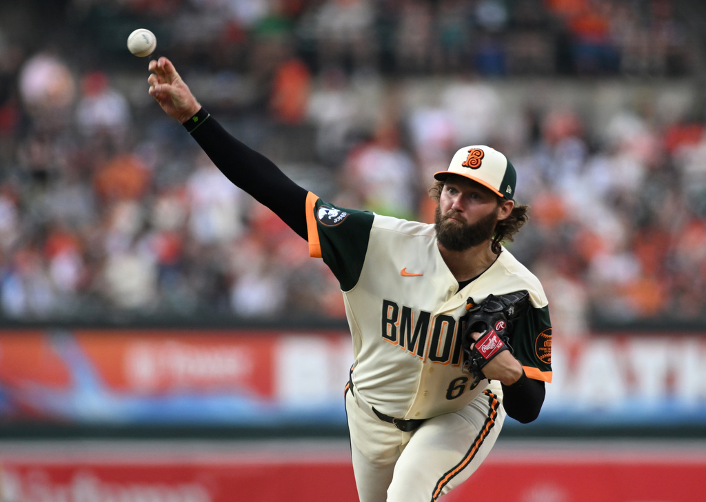 Baltimore Orioles starting pitcher Brandon Young delivers against the Kansas City Royals during the first inning of a baseball game Friday, July 10, 2026, in Baltimore. (AP Photo/Steve Ruark)