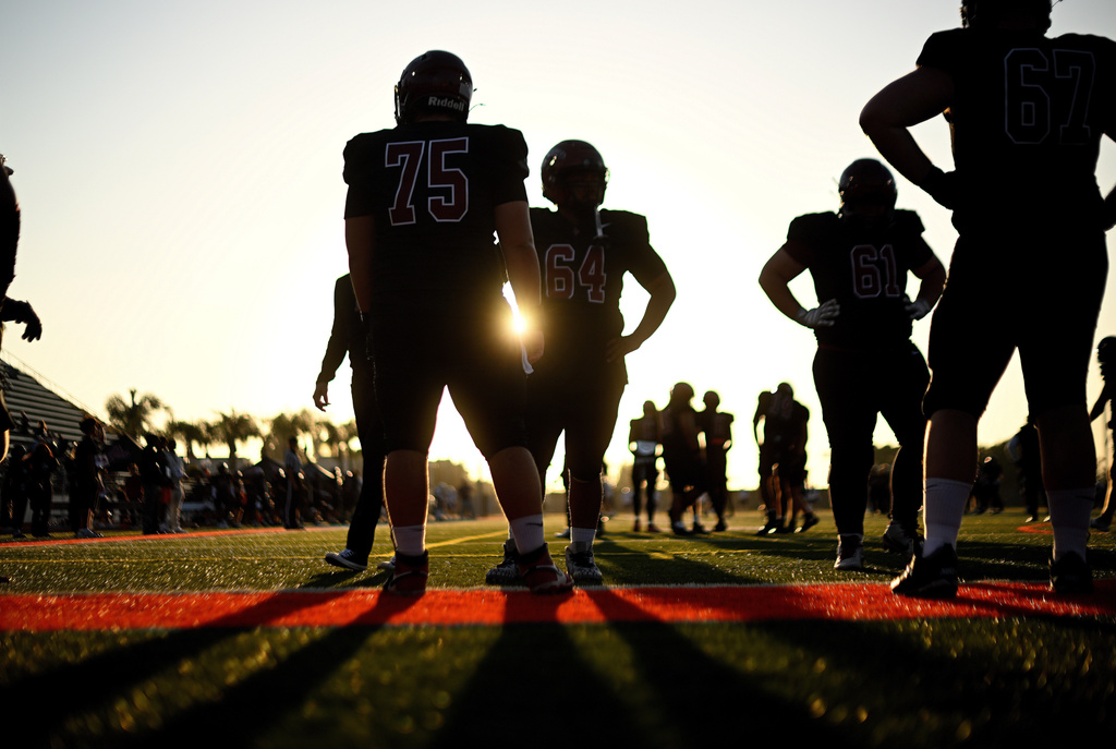 Players from Azusa Pacific warm up before an NCAA Division III college football game against Whittier College, Sept. 19, 2026, in Glendora, Calif. (AP Photo/Wally Skalij)
