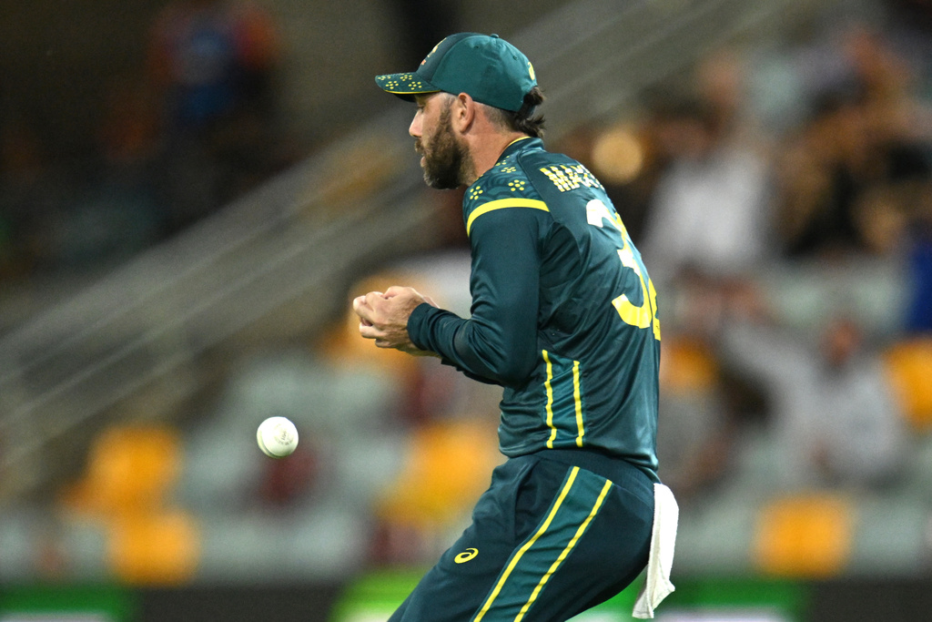 Glenn Maxwell of Australia drops a catch off the batting of Abhishek Sharma of India during a T20 cricket international between India and Australia in Brisbane, Australia, Saturday, Nov. 8, 2025. (Darren England/AAPImage via AP)