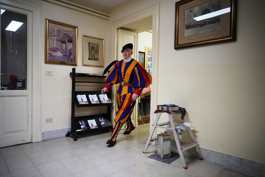 Pontifical Swiss Guards prepare ahead of their swearing in ceremony, at the Vatican, Saturday, Oct. 4, 2025. (AP Photo/Andrew Medichini)