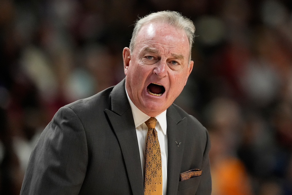 Texas head coach Vic Schaefer yells during the first half of an NCAA college basketball game against Mississippi in the semifinals of the Southeastern Conference tournament, Saturday, March 7, 2026, in Greenville, S.C. (AP Photo/Chris Carlson)