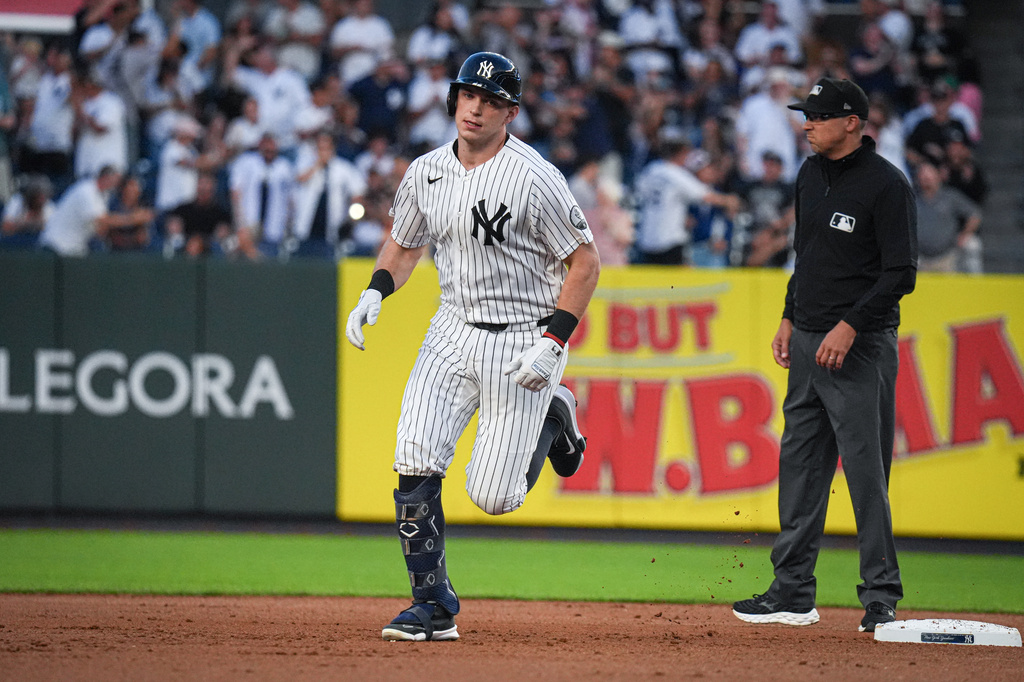 New York Yankees designated hitter Ben Rice rounds second base after hitting a solo home run during the first inning of a baseball game against the Houston Astros Wednesday, Aug. 26, 2026, in New York. (AP Photo/Ryan Murphy)