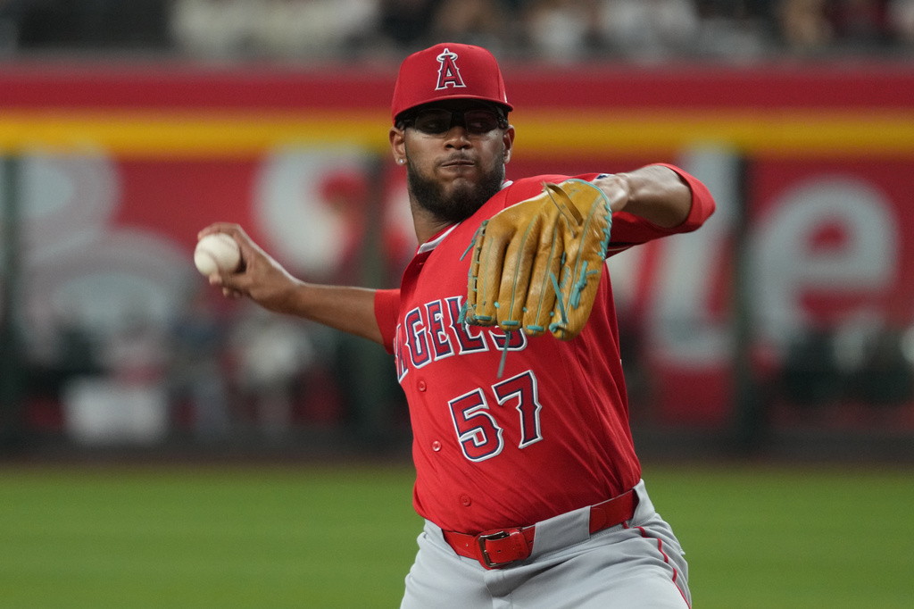 Los Angeles Angels pitcher Walbert Ureña throws against the Arizona Diamondbacks in the first inning of a baseball game, Monday, June 15, 2026, in Phoenix. (AP Photo/Rick Scuteri)