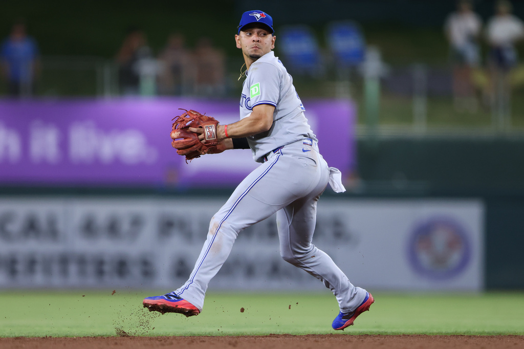 Toronto Blue Jays shortstop Andrés Giménez fields a ground ball off the bat of Athletics' Alika Williams, not shown, before throwing to first base for the out during the fifth inning of a baseball game Tuesday, Sept. 8, 2026, in West Sacramento, Calif. (AP Photo/Scott Marshall)