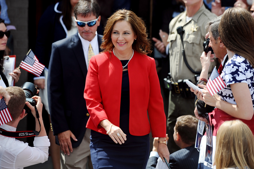 FILE - Darline Graham Nordone, sister of Sen. Lindsey Graham, R-S.C., walks to the stage before his announcement for presidency on Monday, June 1, 2015, in Central, S.C. (AP Photo/Rainier Ehrhardt, File)