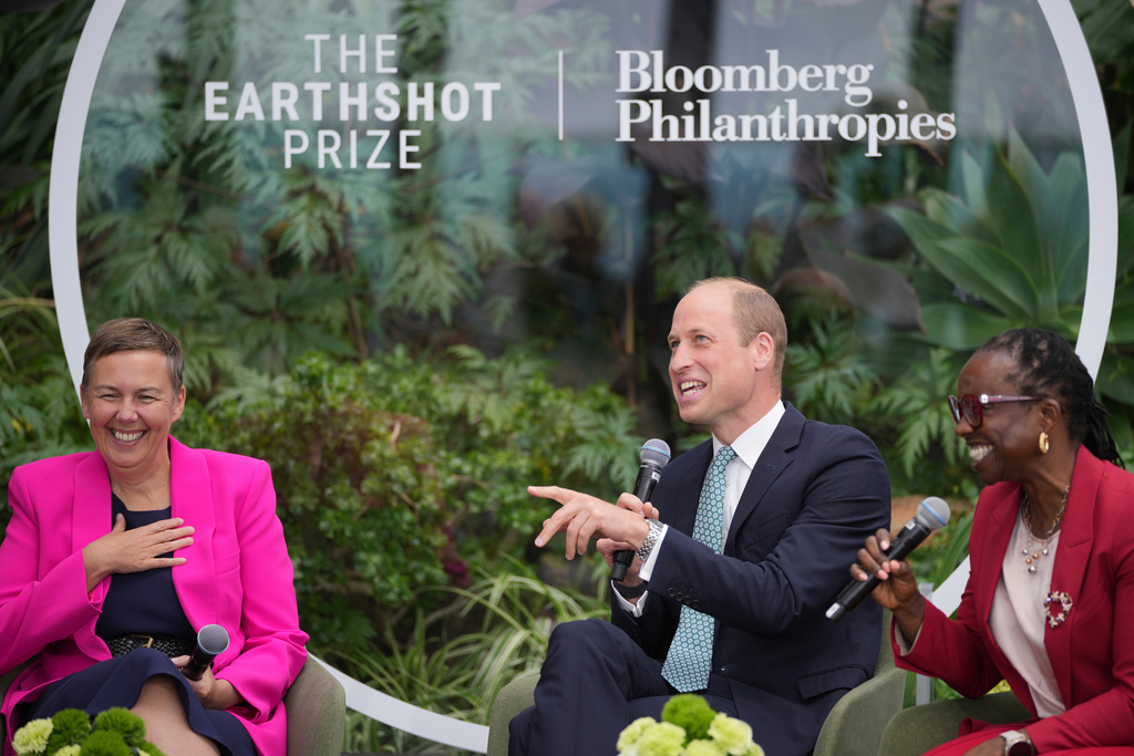 FILE - Britain's Prince William smiles as panelists Hannah Jones, left, and Earthshot Prize Chief Executive, Tokunboh Ishmael attend an Earthshot Prize Innovation Camp in London, on June 27, 2024. (AP Photo/Kin Cheung, Pool File)