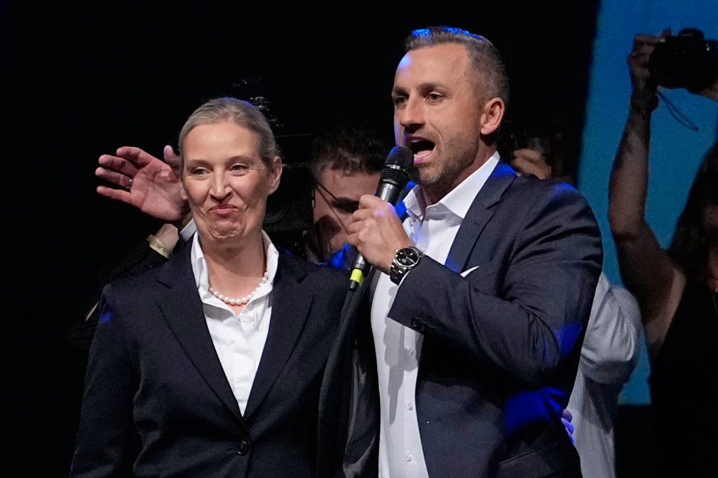 Top candidate Ulrich Siegmund speaks beside party leader Alice Weidel at an election party of the "Alternative for Germany" (AfD) after the Saxony-Anhalt state elections in Magdeburg, eastern Germany, Sunday, Sept. 6, 2026. (AP Photo/Matthias Schrader)