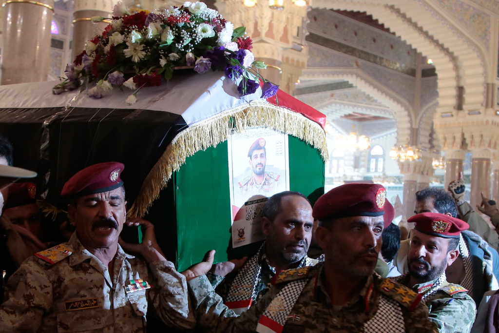 Houthi supporters carry the coffin of Maj. Gen. Muhammad Abdul Karim al-Ghamari, who died after Israeli attack, during his funeral at the people's mosque in Sanaa, Yemen, Monday, Oct. 20, 2025. (AP Photo/Osamah Abdulrahman)
