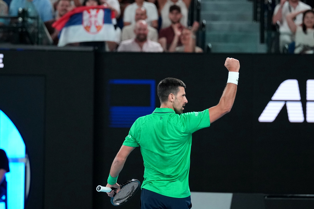 Novak Djokovic of Serbia reacts during his third round match against Botic van de Zandschulp of the Netherlands at the Australian Open tennis championship in Melbourne, Australia, Saturday, Jan. 24, 2026. (AP Photo/Dita Alangkara)