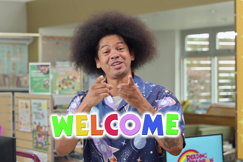 This image released by Embassy Row shows literacy advocate Mychal Threets, host of the children’s series “Reading Rainbow” on the KidZuko YouTube channel. (Embassy Row via AP)