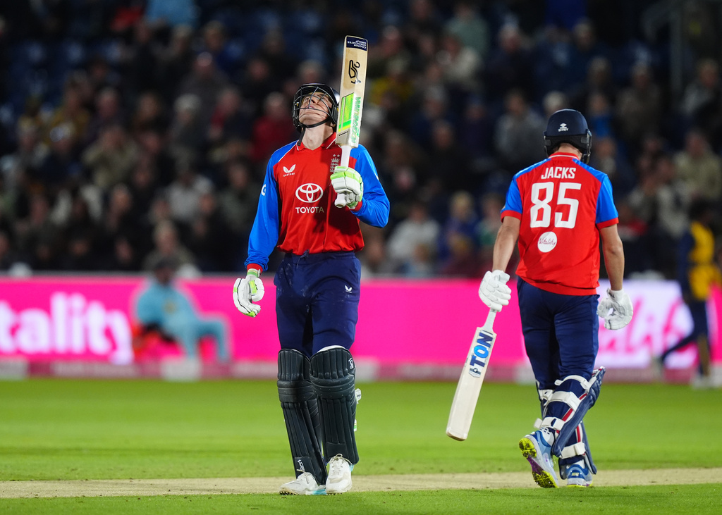 England's Tom Banton celebrates reaching 50 runs during the second IT20 match between England and Sri Lanka in Cardiff, Wales, Thursday Sept. 17, 2026. (David Davies/PA via AP)