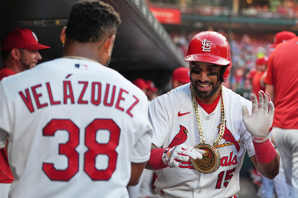 St. Louis Cardinals' José Fermín (15) is congratulated by teammate Nelson Velázquez (38) after hitting a solo home run during the fourth inning of a baseball game against the Milwaukee Brewers Wednesday, July 8, 2026, in St. Louis. (AP Photo/Jeff Roberson)