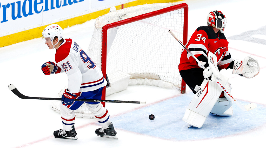 Montréal Canadiens center Oliver Kapanen (91) reacts after scoring against New Jersey Devils goaltender Jake Allen (34) during shootout in an NHL hockey game, Saturday, April 4, 2026, in Newark, N.J. (AP Photo/Noah K. Murray)
