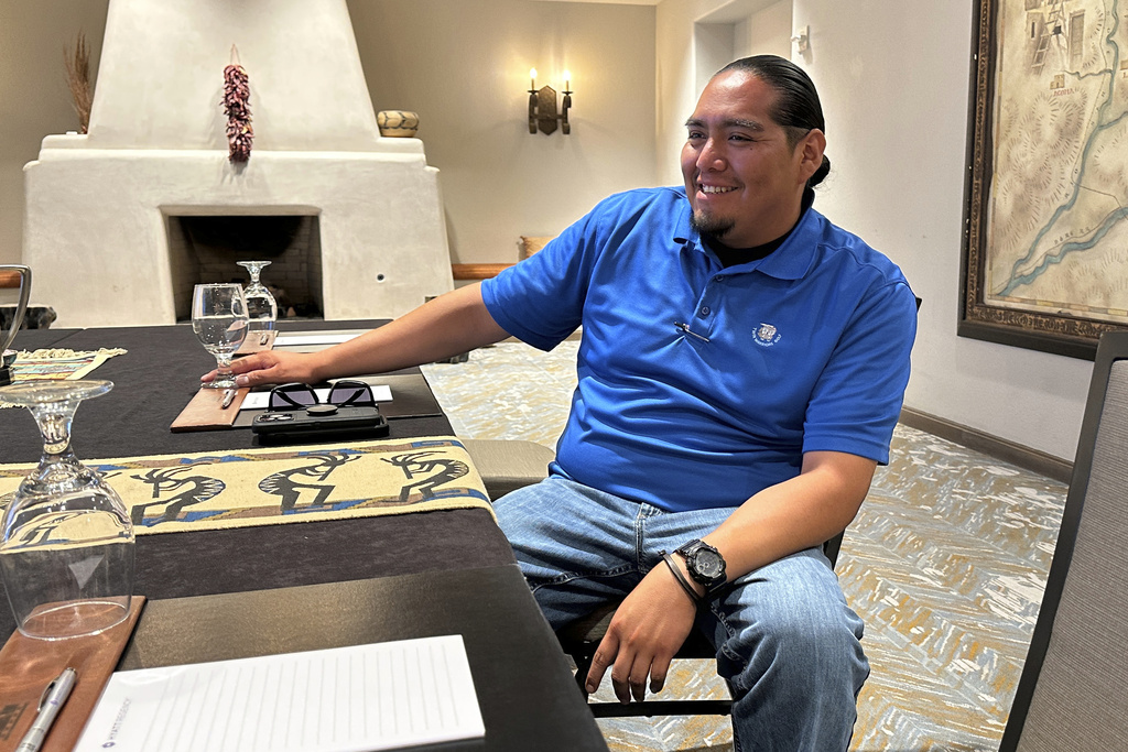 Cultural resources coordinator Jarrett Lujan with Santa Ana Pueblo's Tribal Historic Preservation Department meets with colleagues near Santa Ana Pueblo, New Mexico, on Monday, June 30, 2025. (AP Photo/Susan Montoya Bryan)