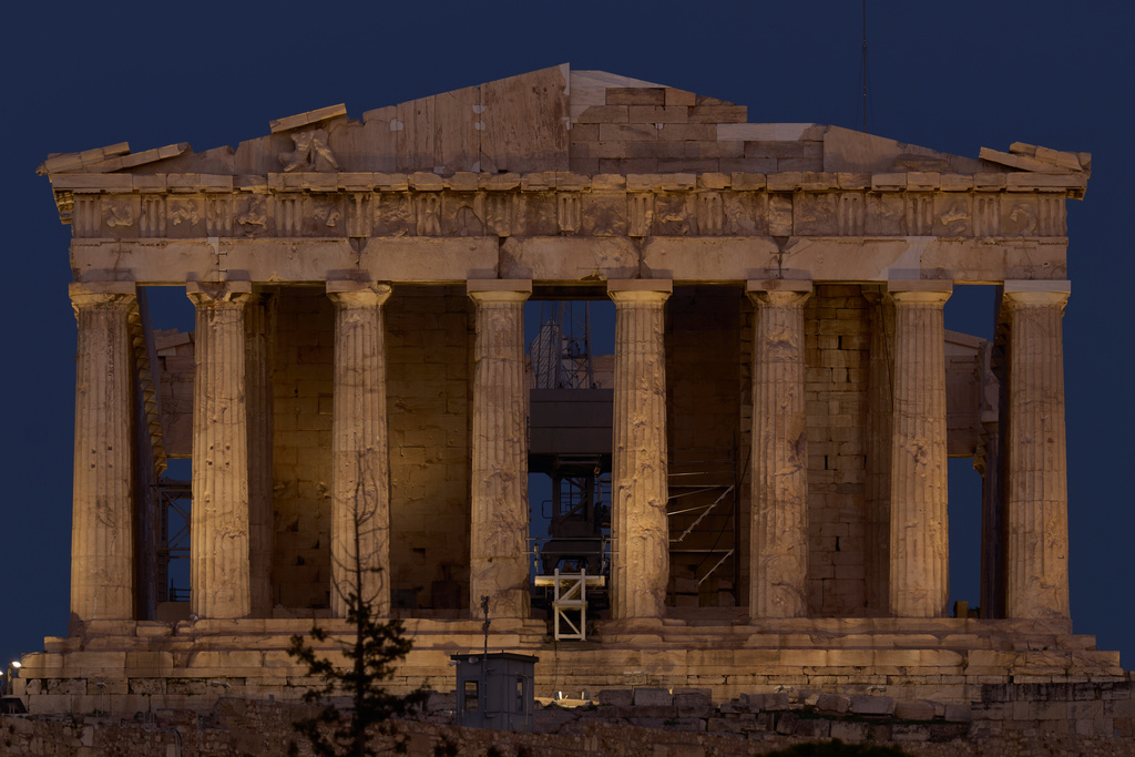 The 5th century B.C. Parthenon temple stands on the Acropolis hill in Athens, on Saturday, Oct. 25, 2025. (AP Photo/Petros Giannakouris)