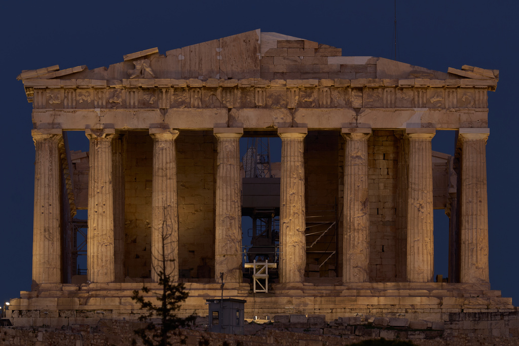 The 5th century B.C. Parthenon temple stands on the Acropolis hill in Athens, on Saturday, Oct. 25, 2025. (AP Photo/Petros Giannakouris)