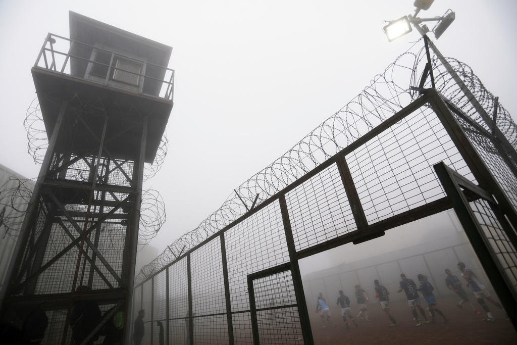 Inmates play rugby at the Valparaiso Prison Complex in Valparaiso, Chile, as part of a social reintegration program, Thursday, Jan. 29, 2026. (AP Photo/Cristobal Escobar)