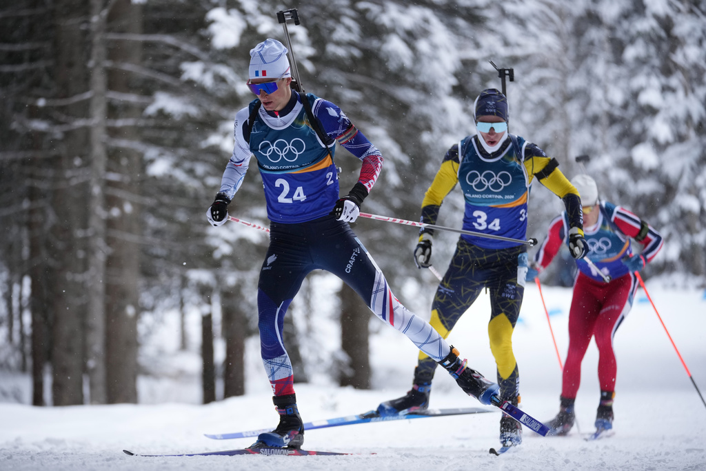 Eric Perrot, of France, competes in the men's 4x7.5-kilometer relay biathlon race at the 2026 Winter Olympics in Anterselva, Italy, Tuesday, Feb. 17, 2026. (AP Photo/Andrew Medichini)