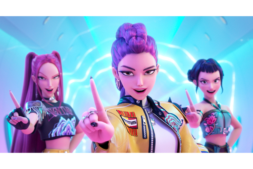 This image released by Netflix shows characters, from left, Mira, Rumi, Zoey in a scene from "KPop Demon Hunters." (Netflix via AP)