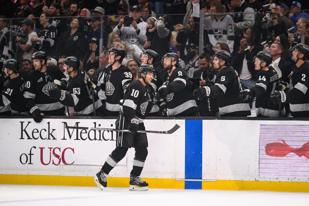 Los Angeles Kings left wing Artemi Panarin (10) greets teammates after scoring during the first period of an NHL hockey game against the Buffalo Sabres, Saturday, March 21, 2026, in Los Angeles. (AP Photo/William Liang)