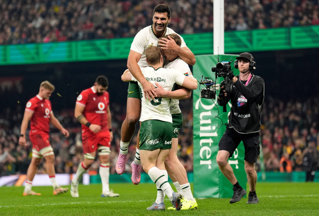 South Africa's Ethan Hooker celebrates scoring a try during the rugby union international match between Wales and South Africa in Cardiff, Wales, Saturday Nov. 29, 2025. (Andrew Matthews/PA via AP)