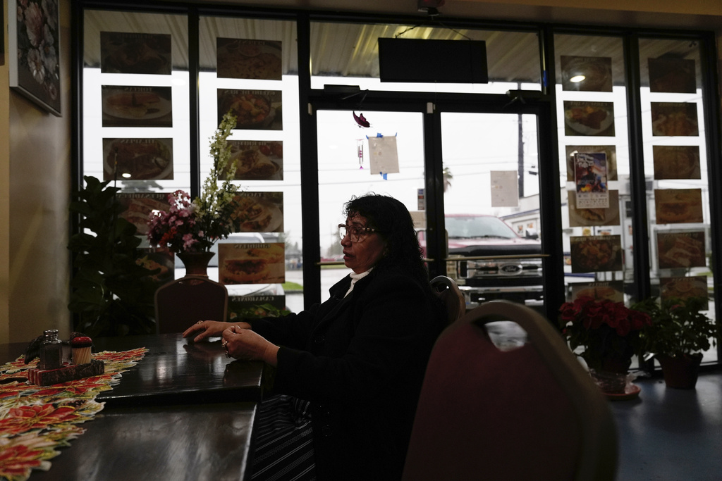 Carmela Diaz speaks inside her closed restaurant in the midst of a Customs and Border Protection immigration crackdown in Kenner, La., Thursday, Dec. 4, 2025. (AP Photo/Gerald Herbert)