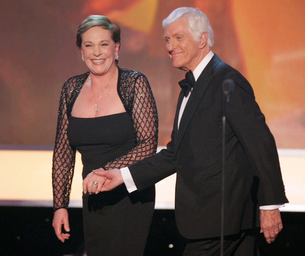 FILE - Julie Andrews, left, is joined by presenter Dick Van Dyke after accepting the 43rd annual life achievement award at the 13th Annual Screen Actors Guild Awards on Sunday, Jan. 28, 2007, in Los Angeles. (AP Photo/Mark J. Terrill, File)