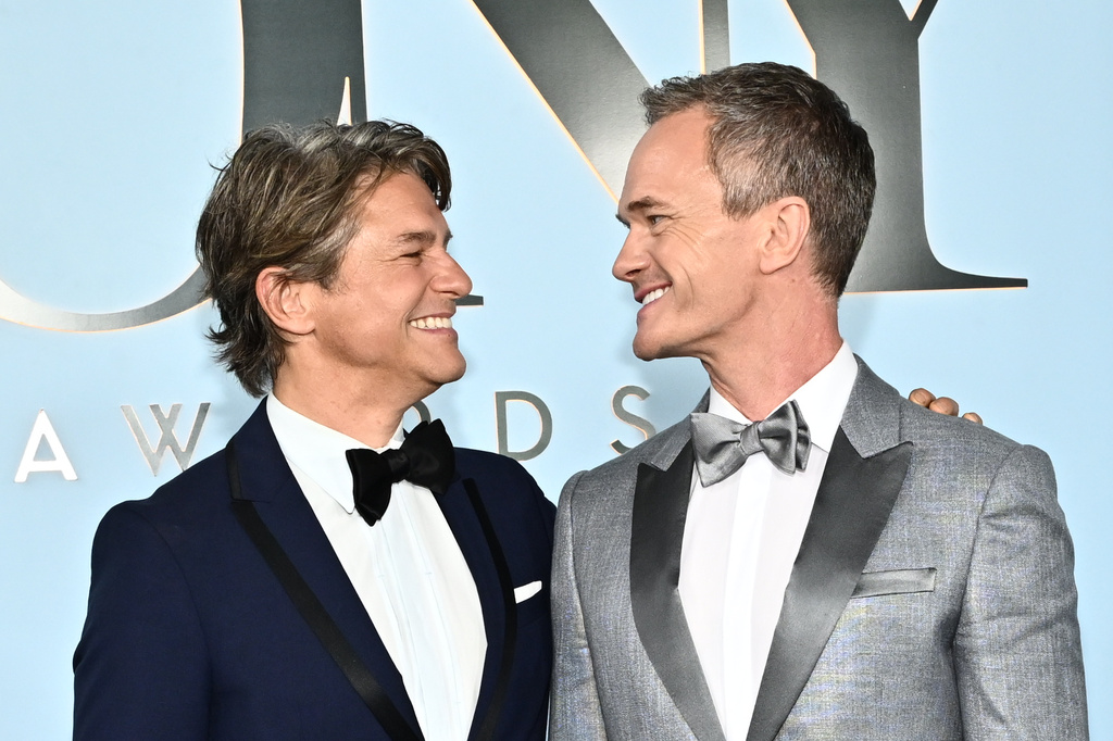 David Burtka, left, and Neil Patrick Harris arrive at the 79th Tony Awards on Sunday, June 7, 2026, at Radio City Music Hall in New York. (Photo by Evan Agostini/Invision/AP)