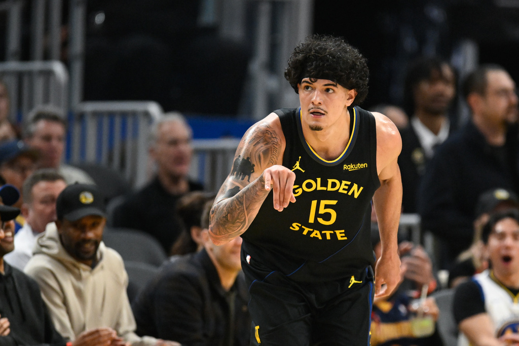 Golden State Warriors forward Gui Santos celebrates a 3-point basket against the Philadelphia 76ers during the first half of an NBA basketball game, Tuesday, Feb. 3, 2026, in San Francisco. (AP Photo/Eakin Howard)