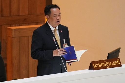 Thailand's Prime Minister Anutin Charnvirakul reads the policy statement at the parliament in Bangkok, Thailand, Monday, Sept. 29, 2025. (AP Photo/Sakchai Lalit) Thailand's Prime Minister Anutin Charnvirakul reads the policy statement at the parliament in Bangkok, Thailand, Monday, Sept. 29, 2025. (AP Photo/Sakchai Lalit)