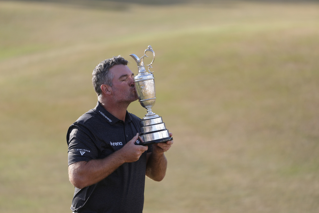 Ryan Fox of New Zealand poses with the Claret Jug trophy after winning the British Open Golf championships at Royal Birkdale golf club, in Southport, England, Sunday, July 19, 2026. (AP Photo/Peter Morrison)