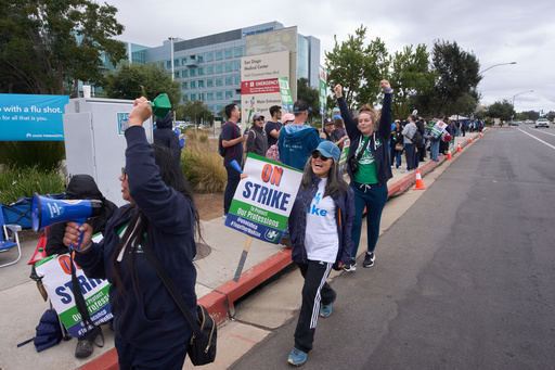 Kaiser Permanente health care workers hold signs and chant slogans while on strike in front of the Kaiser Permanente San Diego Medical Center Tuesday, Oct. 14, 2025, in San Diego. (AP Photo/Gregory Bull) Kaiser Permanente health care workers hold signs and chant slogans while on strike in front of the Kaiser Permanente San Diego Medical Center Tuesday, Oct. 14, 2025, in San Diego. (AP Photo/Gregory Bull)