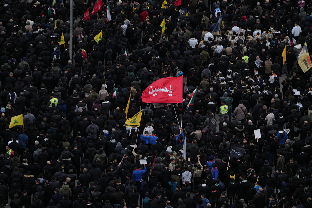 Hezbollah supporters gather to mourn the death of Iranian Supreme Leader Ayatollah Ali Khamenei in the southern Suburb of Beirut, Lebanon, Sunday, March 1, 2026. (AP Photo/Hassan Ammar)
