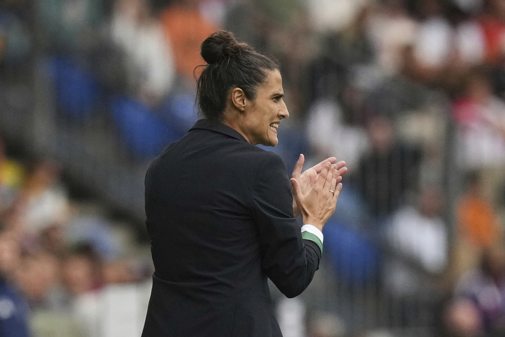 Spain head coach Montserrat Tome claps her hands during the Women's Euro 2025 final soccer match between England and Spain at St. Jakob-Park in Basel, Switzerland, Sunday, July 27, 2025. (AP Photo/Alessandra Tarantino)