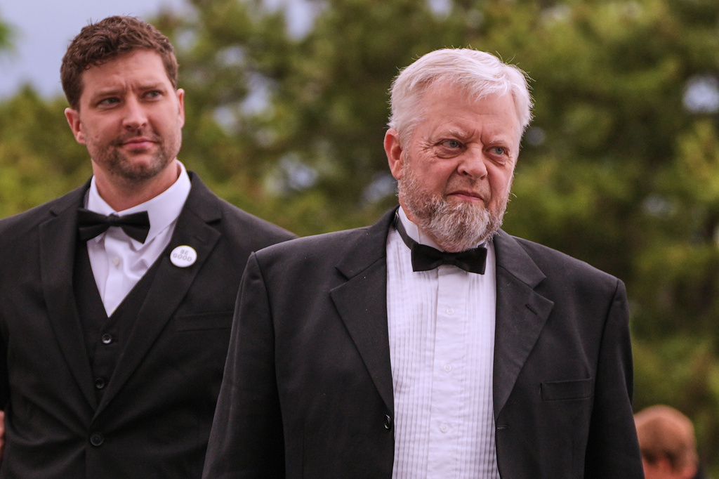 Tim Ganger, right, father of Renee Good, arrives with his son Brent Ganger for the Profile in Courage Award at the John F. Kennedy Presidential Library, Sunday, May 31, 2026, in Boston. (AP Photo/Charles Krupa)