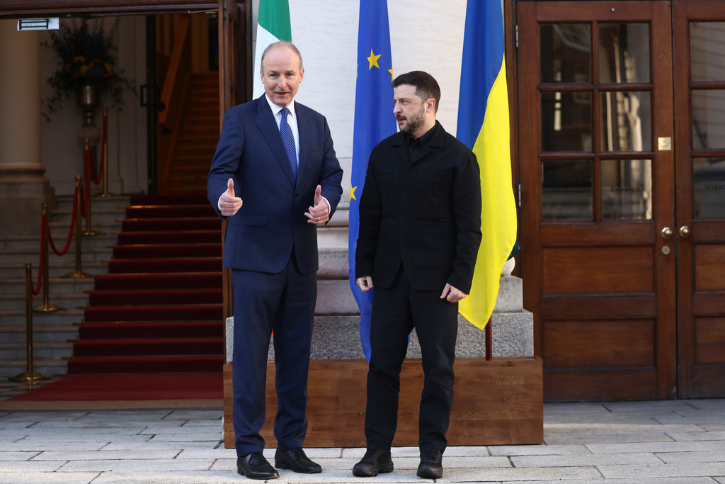CAPTION CORRECTS SPELLING OF NAME Ukraine's President Volodymyr Zelenskyy, right, poses with the Irish Prime Minister Micheal Martin upon his arrival at Government Buildings in Dublin, Ireland, Tuesday, Dec. 2, 2025. (AP Photo/Peter Morrison)