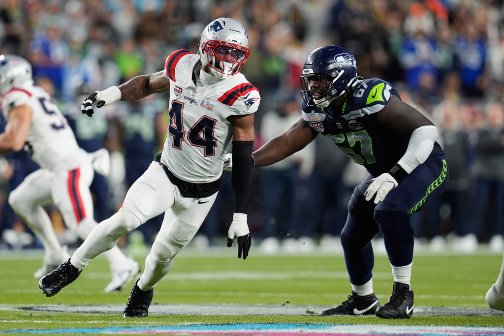FILE -New England Patriots linebacker K'Lavon Chaisson (44) looks to get past Seattle Seahawks offensive tackle Charles Cross (67) during the NFL Super Bowl 60 football game, Sunday, Feb. 8, 2026, in Santa Clara, Calif. (AP Photo/Steve Luciano, File)