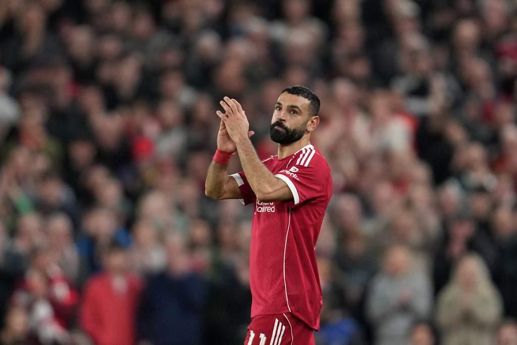 Liverpool's Mohamed Salah leaves the field after substitution during the second leg of the Champions League round of 16 soccer match between Liverpool and Galatasaray, in Liverpool, England, Wednesday, March 18, 2026. (AP Photo/Jon Super)