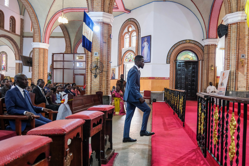 Uganda's leading opposition presidential candidate, Bobi Wine, attends a church service at the Rubaga Cathedral in Kampala, Uganda, Thursday, Jan. 1, 2026. (AP Photo/Hajarah Nalwadda)