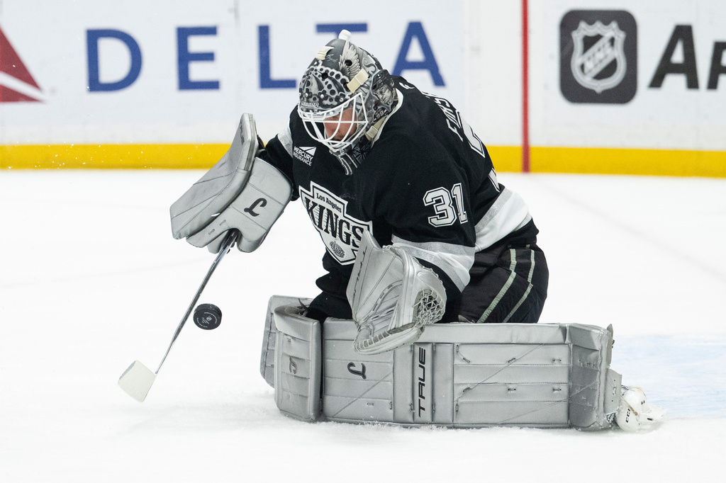 Los Angeles Kings goaltender Anton Forsberg (31) blocks a shot during the first period of an NHL hockey game against the St. Louis Blues, Wednesday, April 1, 2026, in Los Angeles. (AP Photo/Kyusung Gong)