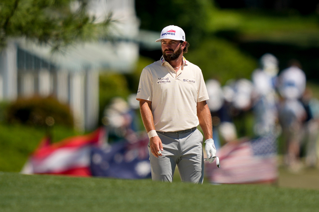 Cameron Young hits from the fairway on the first hole during the final round of the Masters golf tournament at the Augusta National Golf Club, Sunday, April 12, 2026, in Augusta, Ga. (AP Photo/Matt Slocum)