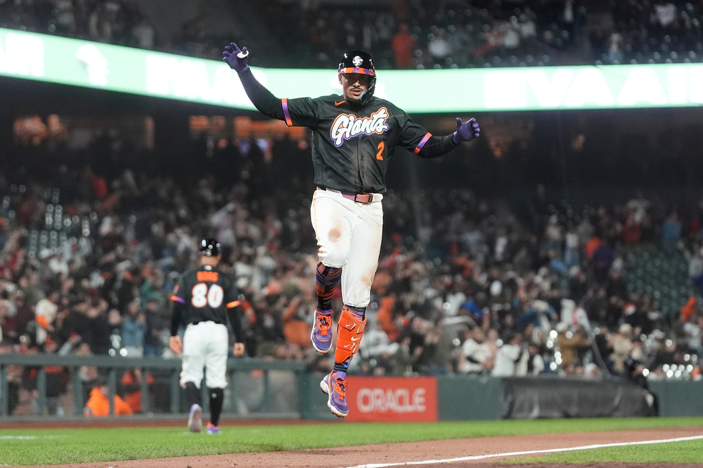 San Francisco Giants' Willy Adames celebrates after hitting a home run against the Arizona Diamondbacks during the ninth inning of a baseball game Tuesday, May 26, 2026, in San Francisco. (AP Photo/Jeff Chiu)