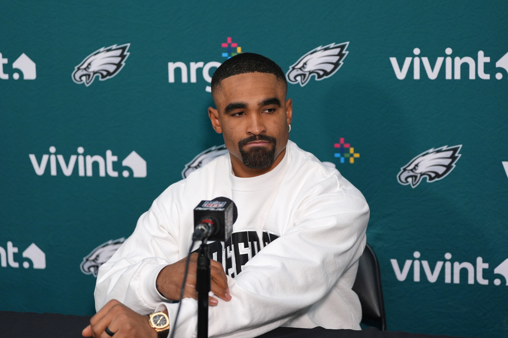 Philadelphia Eagles quarterback Jalen Hurts talks to the media during a news conference following an NFL football game, Saturday, Dec. 20, 2025, in Landover, Md. (AP Photo/Stephanie Scarbrough)