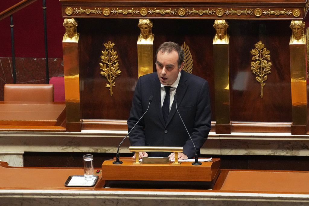 French Prime Minister Sebastien Lecornu delivers his policy speech at the National Assembly, Tuesday, Oct. 14, 2025 in Paris. (AP Photo/Thibault Camus)