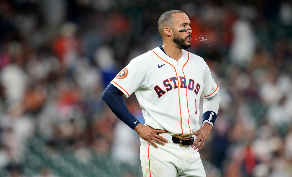 Houston Astros' Carlos Correa (1) reacts after the eighth inning of a baseball game against the New York Yankees, Saturday, April 25, 2026, in Houston. (AP Photo/Karen Warren)