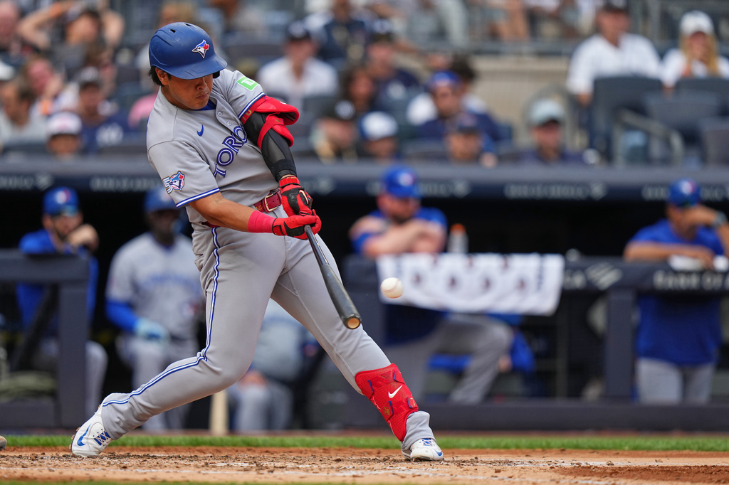 Toronto Blue Jays' Kazuma Okamoto hits a ground-rule double during the fourth inning of a baseball game against the New York Yankees Saturday, Aug. 22, 2026, in New York. (AP Photo/Frank Franklin II)