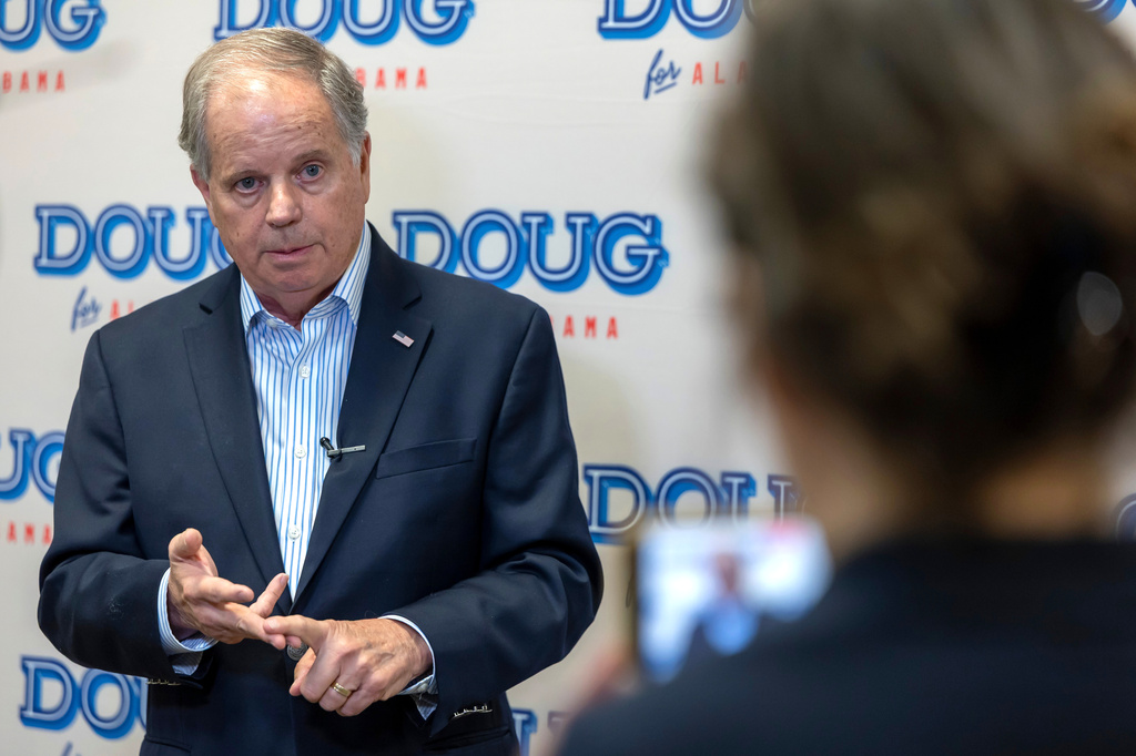 FILE - Doug Jones, Democratic nominee for Governor of Alabama, speaks to the media before a town hall hosted by Troy University College Democrats and the Pike County Democrats, Aug. 18, 2026, in Troy, Ala. (AP Photo/Vasha Hunt, File)